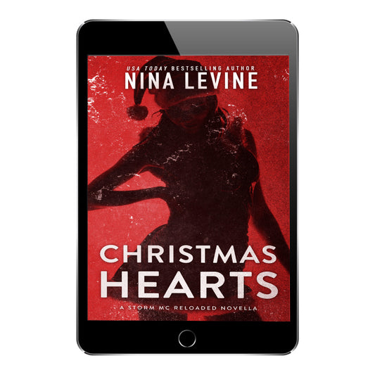 A steamy motorcycle club romance, Christmas Hearts from the Storm MC world by Nina Levine.